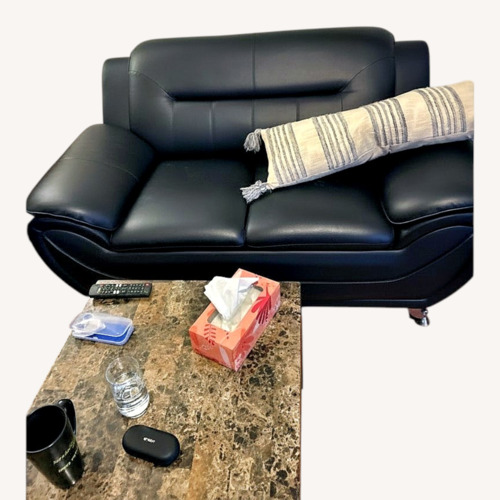 Used Black Leather 2 Seater Sofa for sale on AptDeco