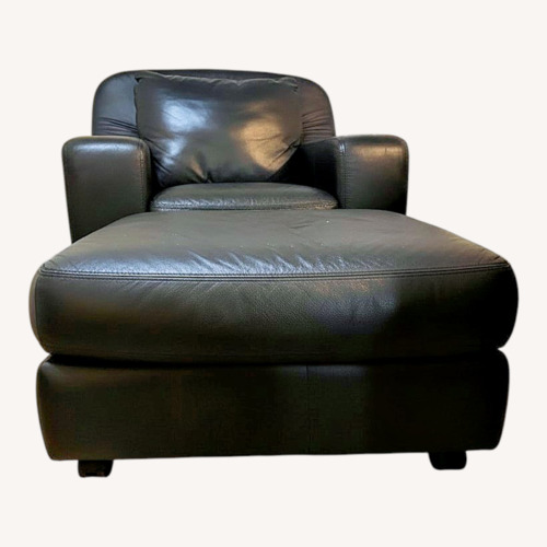 Used Black Leather Armchair with Ottoman for sale on AptDeco