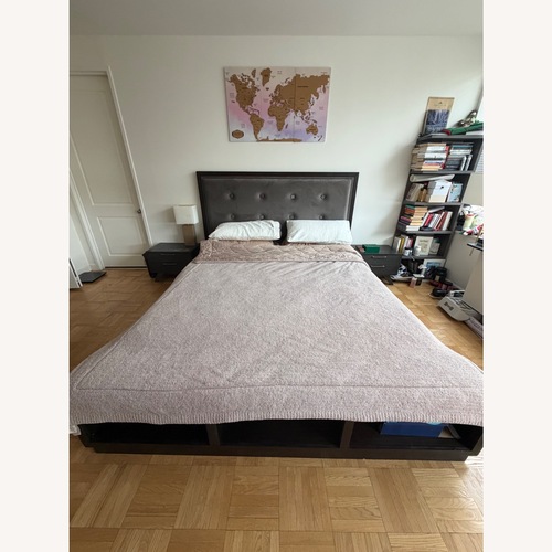 Used Ashley Furniture Dark Gray Wood King Bed for sale on AptDeco