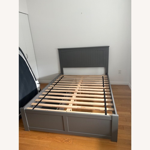 Used Solid Wood Storage Platform Bed for sale on AptDeco