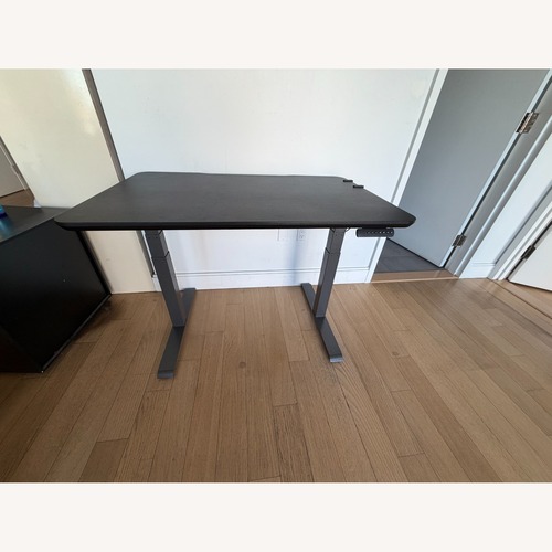 Used Vari Adjustable Standing Desk for sale on AptDeco