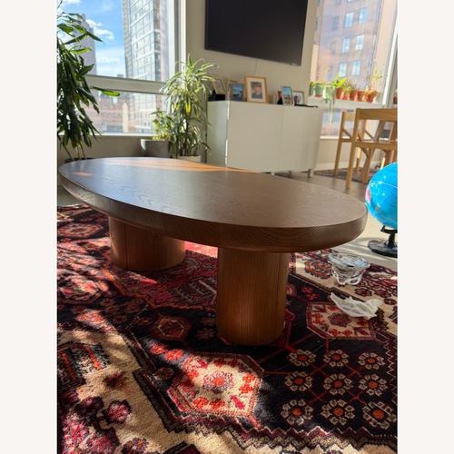 Used Article Baarlo Dark Brown Wood Coffee Table for sale on AptDeco