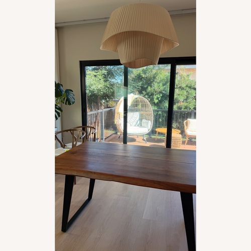 Used Crate & Barrel Wood Dining Table for sale on AptDeco