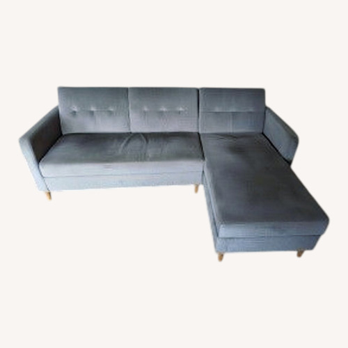 Used Grey Fold-Down Sleeper Sofa with Storage Section for sale on AptDeco
