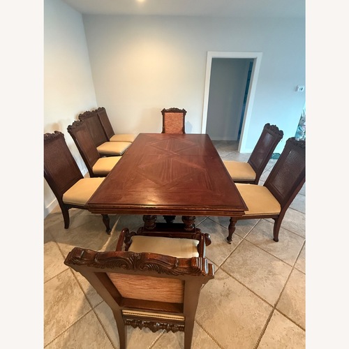 Used Dark Brown Wood Dining Set for sale on AptDeco