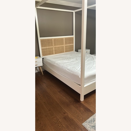 Used Pottery Barn White Westly Cane Canopy Bed for sale on AptDeco