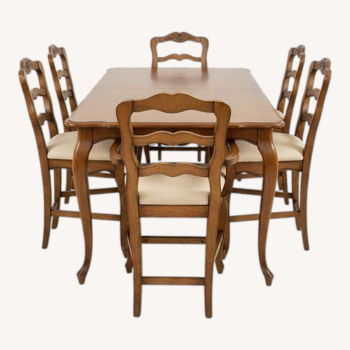 Used Light Brown Wood Dining Set for sale on AptDeco