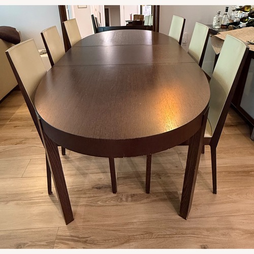 Used Calligaris Dark Brown Wood Dining Table for sale on AptDeco