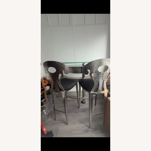 Used Vintage Memphis Style Stainless Steel Bar Stools for sale on AptDeco