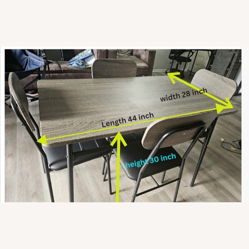 Used Light Brown Wood Dining Table for sale on AptDeco