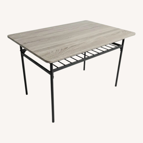 Used Light Brown Wood Dining Table for sale on AptDeco