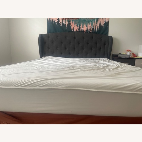 Used Queen Bed Frame With Tufted Nails for sale on AptDeco