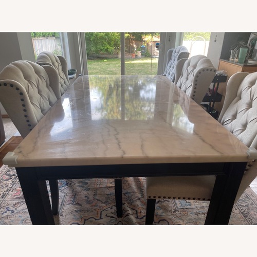 Used Ashley Furniture White Marble Dining Table for sale on AptDeco