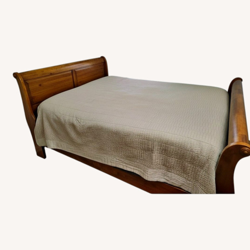 Used Light Brown Wood Queen Bed for sale on AptDeco