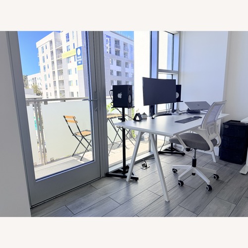 Used IKEA TROTTEN Desk 63x31 - White for sale on AptDeco