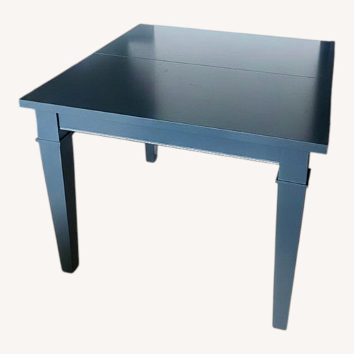 Used Bassett Blue Wood Dining Table (Extendable) for sale on AptDeco