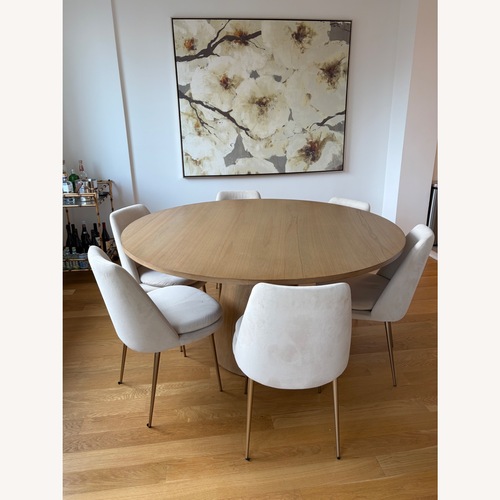 Used Contemporary 59” Round Wood Dining Table for sale on AptDeco