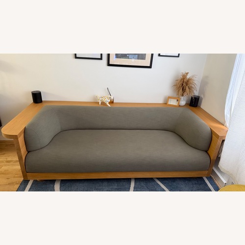 Used Native Sofá Natural Wood Green Fabric  for sale on AptDeco