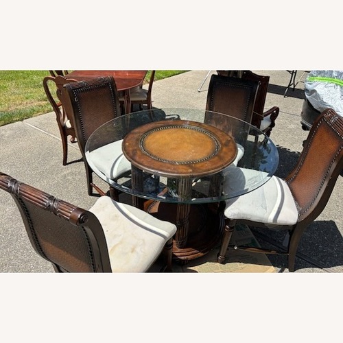 Used Natural Glass Dining Set W Chairs for sale on AptDeco