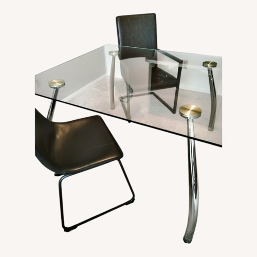 Used Glass Table Silver Chrome Legs With 2 Chairs for sale on AptDeco