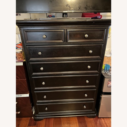 Used Black 7-Drawer Tall Dresser / Chest for sale on AptDeco