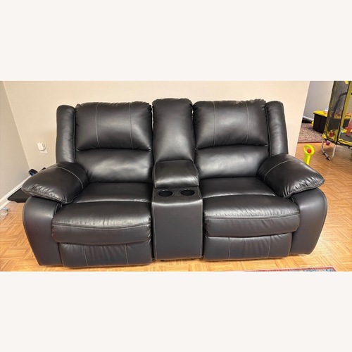 Used Ashley Furniture Black Loveseat for sale on AptDeco