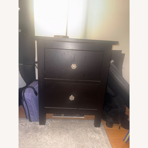 Used IKEA Dark Brown Wood Nightstand for sale on AptDeco