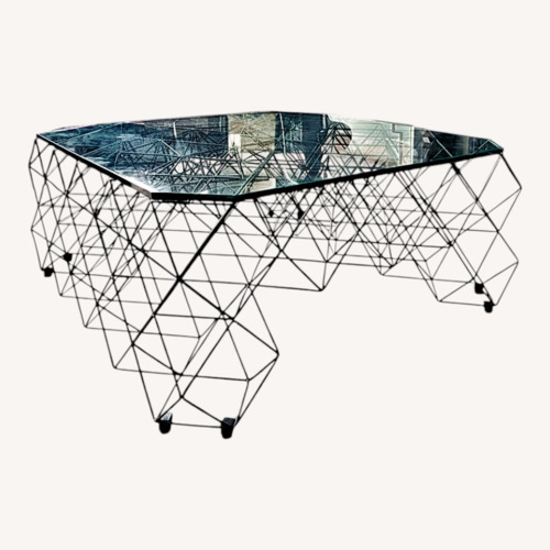 Used From The Source Glass Coffee Table with sculptural base for sale on AptDeco