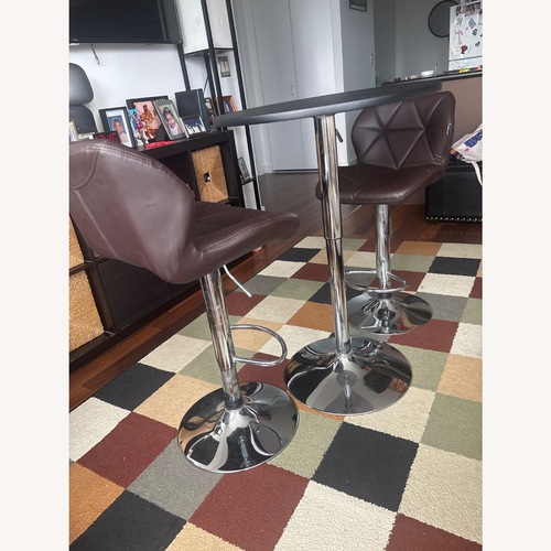 Used Bar Table 2 Stool Set for sale on AptDeco