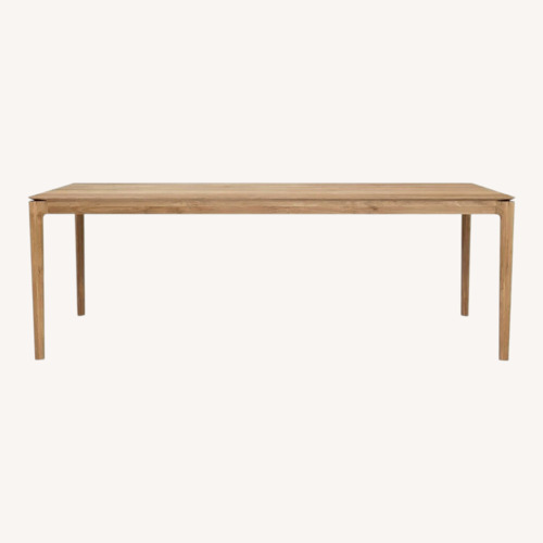 Used Amazon Oak Bok Dining Table for sale on AptDeco