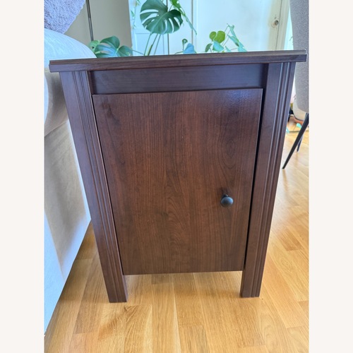 Used IKEA BRUSALI Dark Brown Nightstand for sale on AptDeco