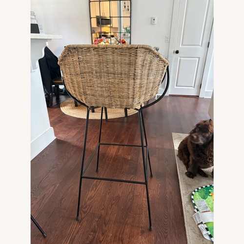 Used CB2 Cesta Rattan Counter Stools - Set of 4 for sale on AptDeco