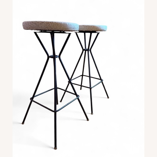 Used Vintage MCM Cream Metal Swivel Bar Stools for sale on AptDeco