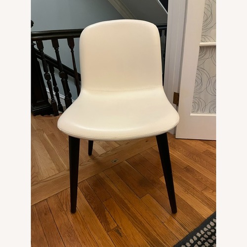 Used Design Within Reach Bacco Chair in White Leather with Black Wood Legs for sale on AptDeco