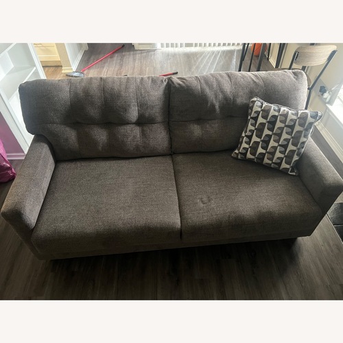 Used Ashley Furniture Light Brown Loveseat for sale on AptDeco