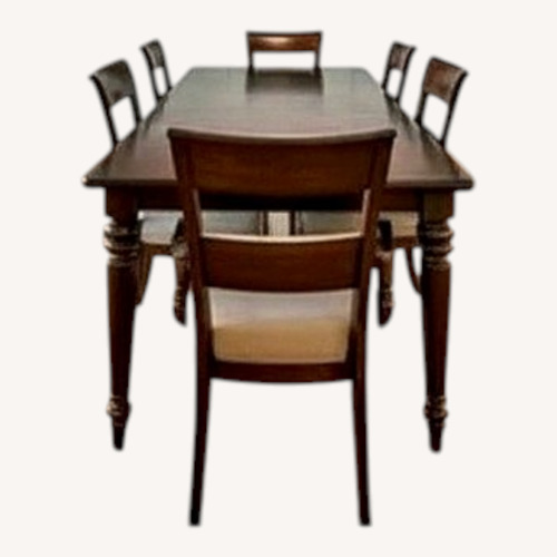 Used Dark Brown Wood Dining Set for sale on AptDeco