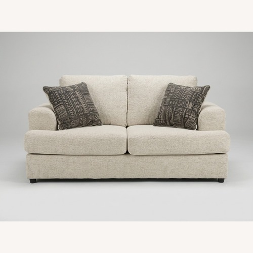 Used Ashley Furniture Light Brown Fabric Loveseat for sale on AptDeco