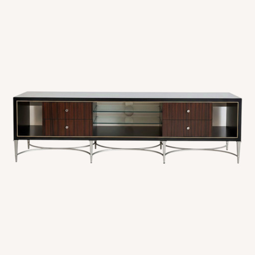 Used Caracole Media Console Black Wood Champagne Legs for sale on AptDeco