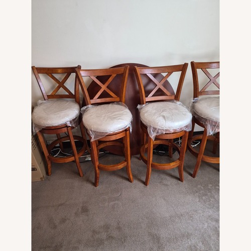 Used Dark Brown Wood Dining Set for sale on AptDeco