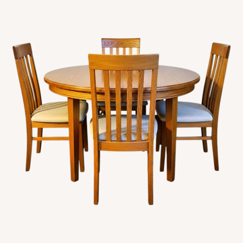 Used Dark Brown Wood Dining Set for sale on AptDeco