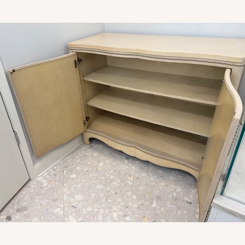 Used Cream Wood and Linen Door Cabinet for sale on AptDeco
