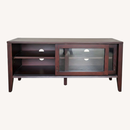 Used Dark Brown Storage Cabinet w Glass Sliding Doors for sale on AptDeco