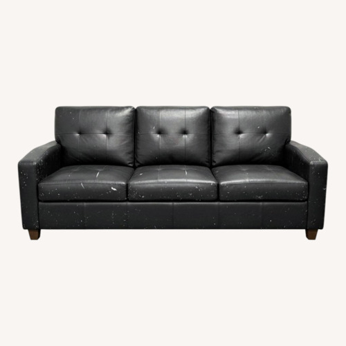 Used Black Sectional Couch With Cup Holder and Storage for sale on AptDeco