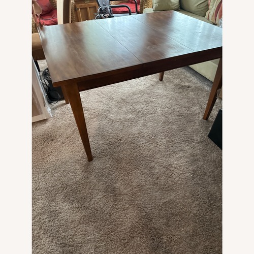 Used Vintage/Antique Finds Dark Brown Dining Table for sale on AptDeco