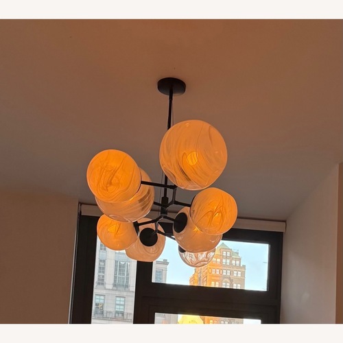 Used Anthropologie Cloud Organic Glass Globe Chandelier for sale on AptDeco