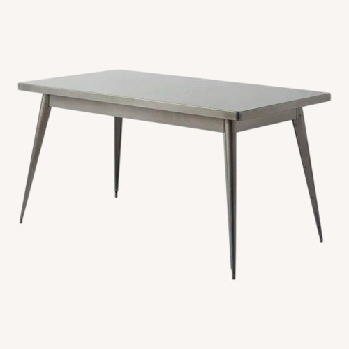 Used Tolix Raw Varnished Stainless Steel Dining Table for sale on AptDeco
