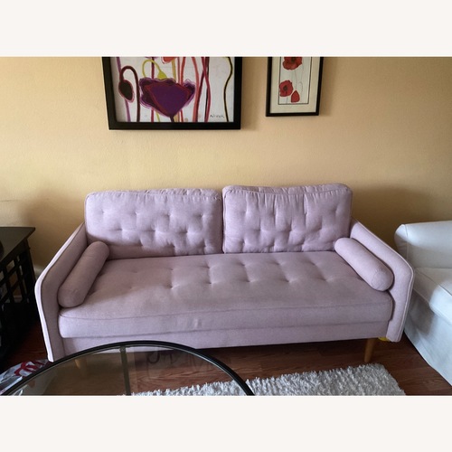 Used Mid Century Style Soft Pink Couch for sale on AptDeco