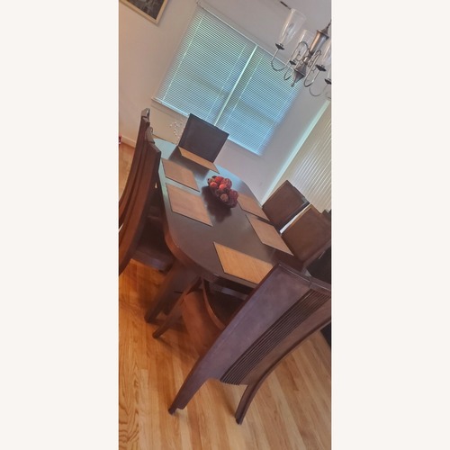 Used Ashley Solid Wood Dining Set for sale on AptDeco