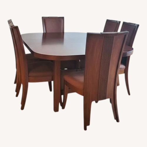 Used Ashley Solid Wood Dining Set for sale on AptDeco