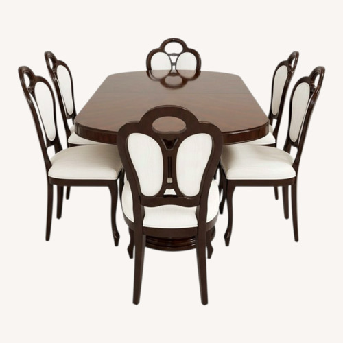 Used  Dining Room Chairs and a Table made in Italy for sale on AptDeco